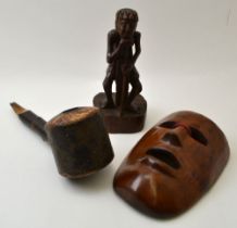 Three items of treen, includes a carved hardwood mask, possibly Japanese, a carved wood figure of an