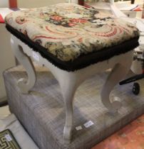 A small white painted stool with tapestry top