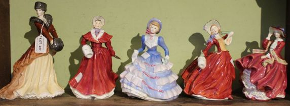 A collection of four Royal Doulton & one Royal Worcester bone china figurines of ladies