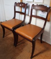 A set of four dining chairs *** expand