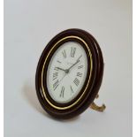 A Cartier Baignoire oval desk clock.