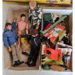 Four 1970s Action man figures and accessories.