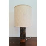 A 1960s printing block table lamp and shade.