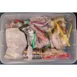 A box containing a large quantity of costume jewellery to include bracelets, beads etc