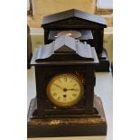 Four black slate and marble mantle clocks.