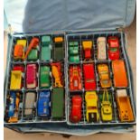 A Matchbox series collection case and cars.