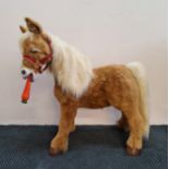 A FurReal Friends Butterscotch pony with box.