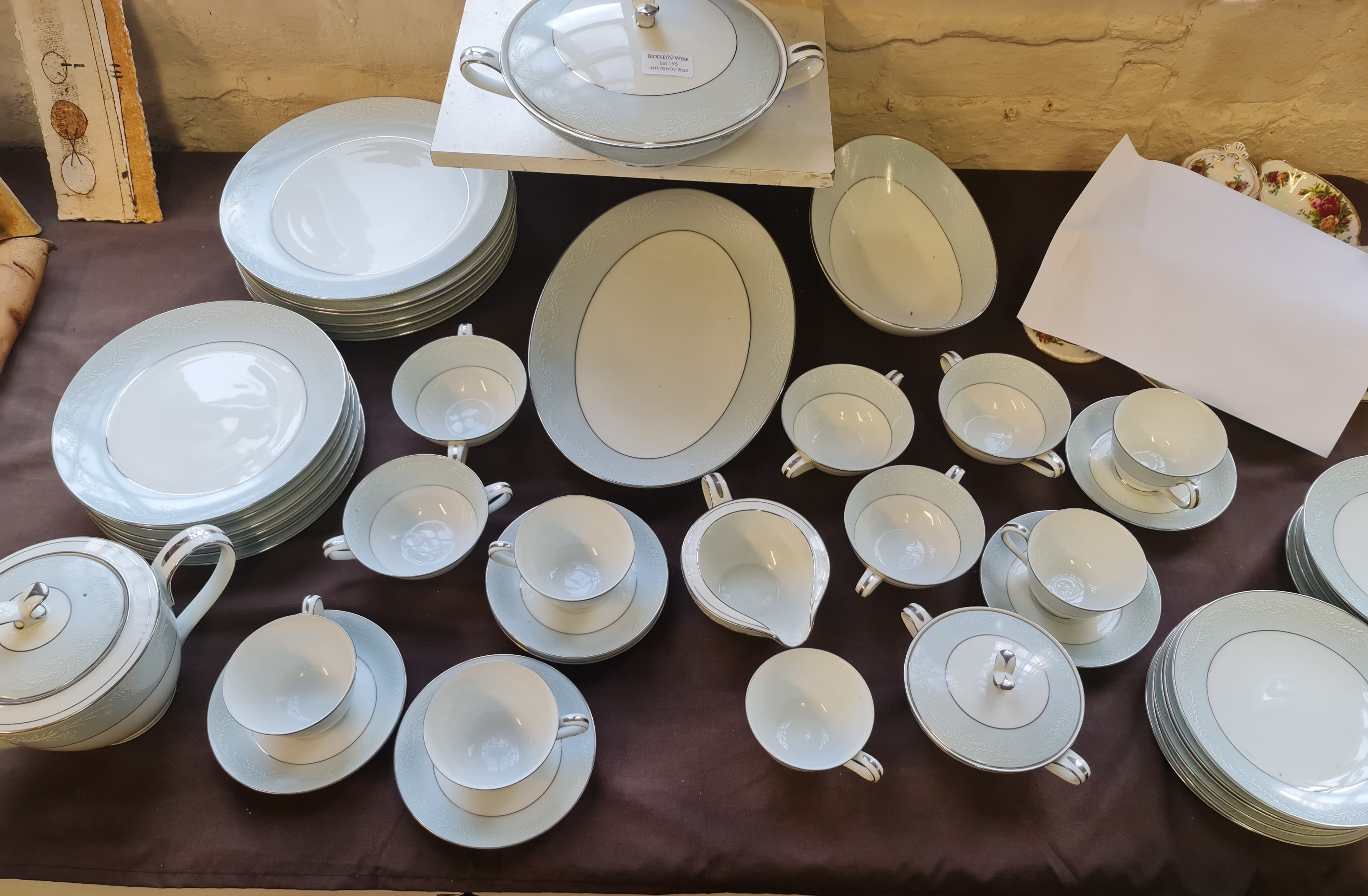 A Noritake Laureate dinner and tea service consisting of 12 plates, turean and cover, tea pot,
