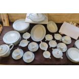 A Noritake Laureate dinner and tea service consisting of 12 plates, turean and cover, tea pot,