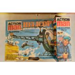 A 1970s Action man helicopter and helicopter pilot with boxes.