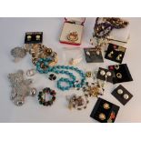 Various costume jewellery to include, beads, earrings, brooches , necklaces