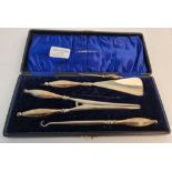 A collection of hallmarked silverware to include, a shoe horn, button hooks, glove stretchers ( in