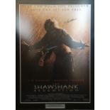 The Shawshank Redemption movie poster signed by Morgan Freeman, Tim Robbins, and James Whitmore .
