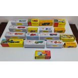 A collection of boxed diecast cars and trucks.