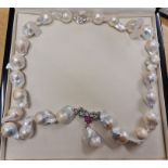A Basia Zarzycka baroque pearl necklet, with pink sapphire (possibly synthetic) and cubic zirconia