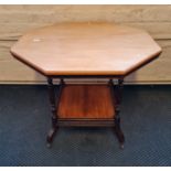 A Edwardian mahogany hexagonal topped table on four tuned and fluted legs.