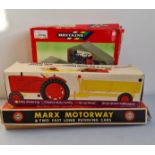 A Britains farm set Marx motorway and Nuffield tractor .