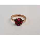 A hallmarked 9ct yellow gold gem stone cluster ring, ring size L1/2