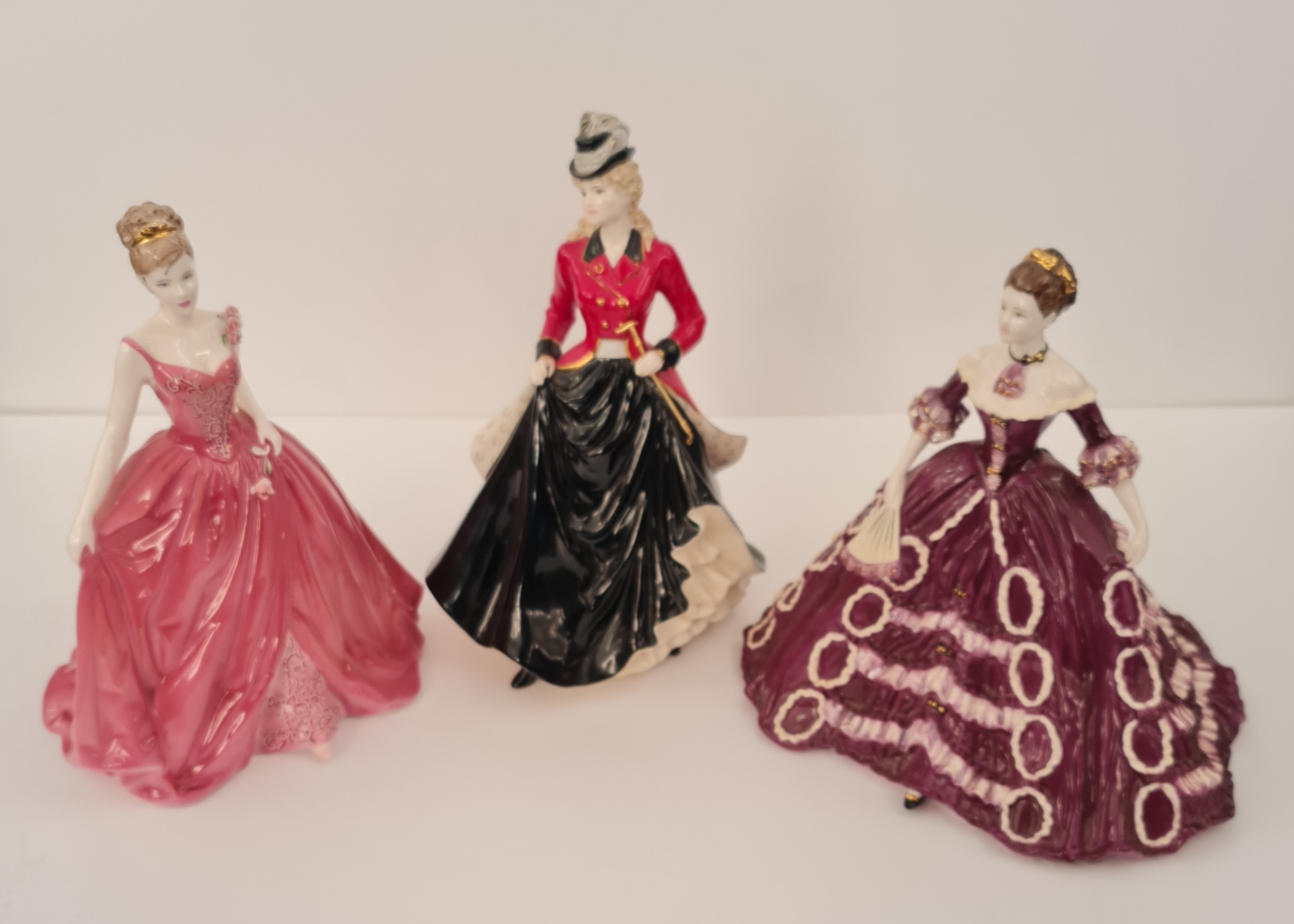Three Coalport figures Kate, Charity Ball Victoria, and Dangerous Liaisons.
