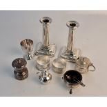 A collection of hallmarked silver to include, two napkin rings, mustard pot, salt pot both with