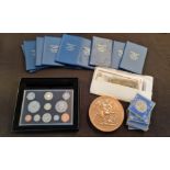 An eclectic assortment of coins and banknotes including 1977 Jubilee crowns,1970 decimal coins,