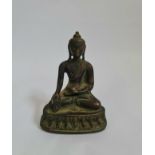 A Tibetan bronze Buddha statue sitting height 12 cm.