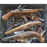 Seven reproduction flintlock pistols and Wall brackets.