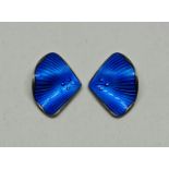 A pair of Ivar Holth Norwegian guilloche enamel earrings, both of fan design featuring blue