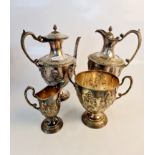 Two large decorative jugs, a two handled bowl and milk jug