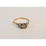 A single stone diamond ring, approx. 0.50cts, flanked either side with diamond accents, assessed