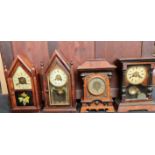 Four American style mantle clocks.