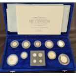 The UK Millennium silver collection of 9 coins plus a Maundy set.