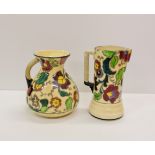 Two Tuscan Decorous pottery water jugs hand painted flowers and leaf design.
