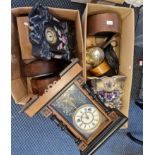 Two boxes of mantle clocks and wall clocks.