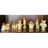 Seven Beswick Beatrix Potter Peter Rabbit figures.