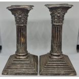 A pair of Victorian silver weighted column candlesticks, hallmarked Sheffield 1899, height approx.