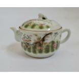 A 19th century Chinese teapot famille rose butterfly and bird design with a red square character