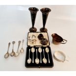 Various hallmarked silver to include 6 tea spoons, a patterned jug, a pair of candlesticks (A/F),