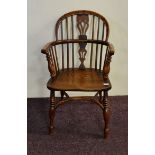 A 19th century yew and elm Windsor chair with hoop back height approx 90 cm.