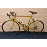 A Joe Waugh road bike 753 Reynolds frame Cinelli handlebars and a Rolls saddle.