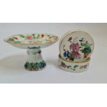 A 19th century Chinese famille rose tazza height 8,5 cm together with a famille rose pot and lid