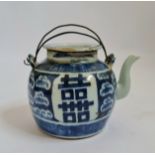 A 19th century Chinese blue and white teapot cloud design with metal handles height 12 cm.
