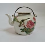 A 19th century Chinese teapot famille rose bird and flower design with metal twist handles height