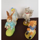 A Beswick 100 years Peter Rabbit a Wade Andy Pandy a Royal Doulton Spike and Tyke and a Beswick