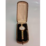 A hallmarked 9ct yellow gold cased ladies cocktail wristwatch, on gold plated expanding bracelet