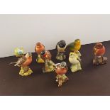 Nine Beswick bird figurines.