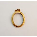 A photograph pendant frame, stamped 9ct.