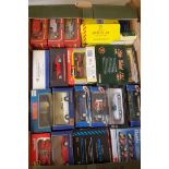 A collection of boxed diecast vehicles in box.