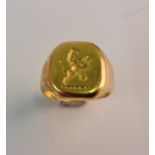 A signet ring, with monogram of a lion, stamped 22ct, ring size M.