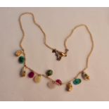 A seed pearl and gem stone necklace